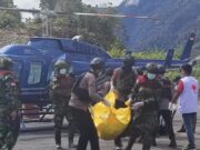 TNI Kerahkan Helikopter Evakuasi Korban Separatis Teroris 355d67cea67ce27aaa8bc0d5fc51a15d.jpeg
