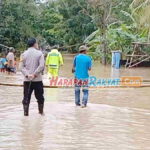 Banjir-Belum-Surut-Warga-Pamotan-Pangandaran-Tutup-Akses-Jalan.jpg